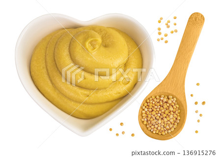 Mustard sauce in ceramic bowl with seed isolated on white background. Top view. Flat lay Mustard sauce in ceramic bowl with seed isolated on white background. Top view. Flat lay 136915276