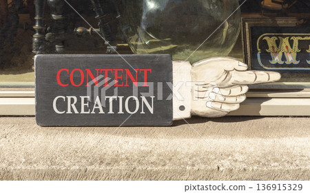 Time for content creation symbol. Concept words Content creation on beautiful wooden black sign as a hand. Beautiful store display background. Business time for content creation concept. Copy space. Time for content creation symbol. Concept words Content creation on beautiful wooden black sign as a hand. Beautiful store display background. Business time for content creation concept. Copy space. 136915329