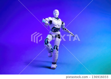 White humanoid robot posing in vibrant purple blue gradient background 136916033