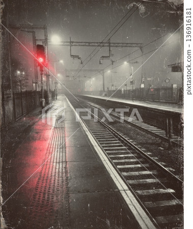 Empty Railway Platform With Red Signal And Rainy Fog Atmosphere Empty Railway Platform With Red Signal And Rainy Fog Atmosphere 136916181