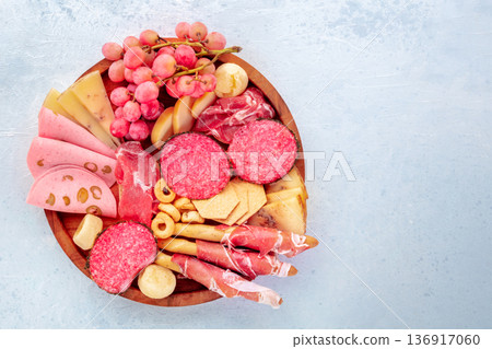 Italian Antipasti tray. Charcuterie platter with cheese and deli meats Italian Antipasti tray. Charcuterie platter with cheese and deli meats 136917060