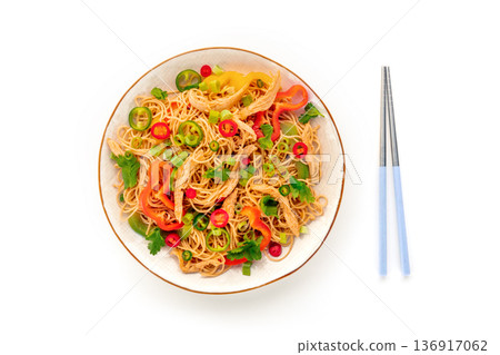 Chow Mein noodles with chicken and vegetables, overhead flat lay shot 136917062