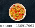 Hakka noodles with vegetables, peppers and green onions, overhead shot 136917063