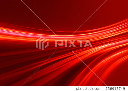 An abstract digital background of bright red and orange wavy light trails creating a dynamic, speed-like motion effect on a dark red gradient. 136917749