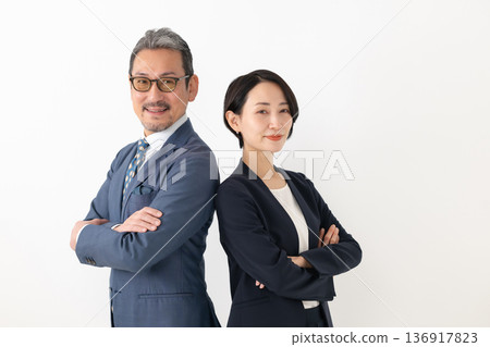 Business person with arms folded 136917823