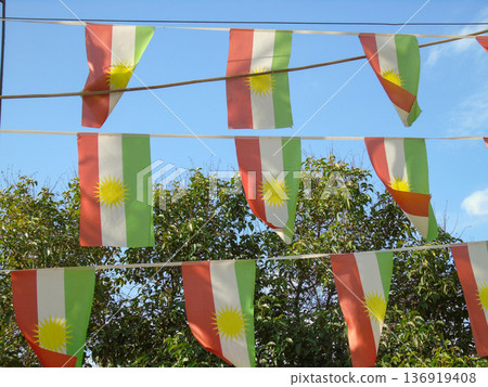 Kurdish flags flutter in the wind at a park in Erbil, Iraq Kurdish flags flutter in the wind at a park in Erbil, Iraq 136919408