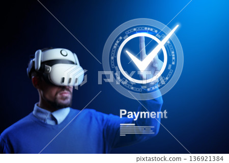 Person using virtual reality to make a banking invoice payment in a digital environment Person using virtual reality to make a banking invoice payment in a digital environment 136921384