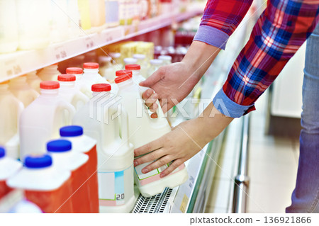 Shopping milk in store Shopping milk in store 136921866