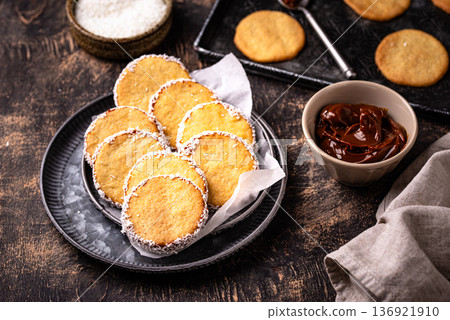 Alfajores, traditional Spanish sandwich cookies Alfajores, traditional Spanish sandwich cookies 136921910