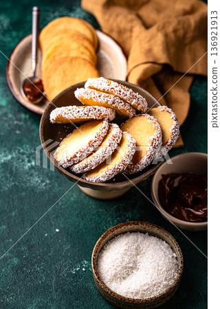 Alfajores, traditional Spanish sandwich cookies Alfajores, traditional Spanish sandwich cookies 136921913