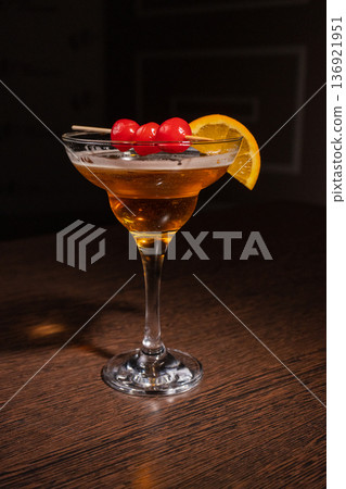 A champagne cocktail in a beautiful glass with 136921951