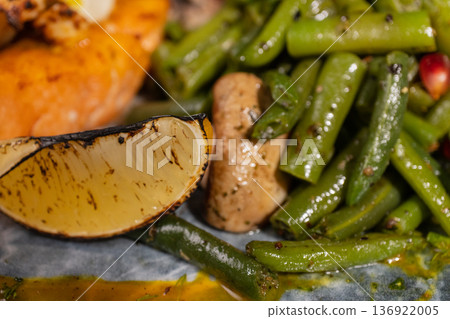 Fried salmon with vegetables and mushrooms 136922005