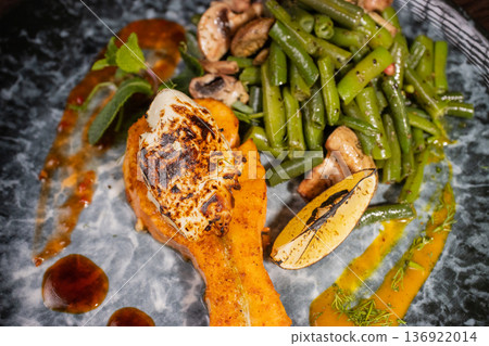 Fried salmon with vegetables and mushrooms 136922014