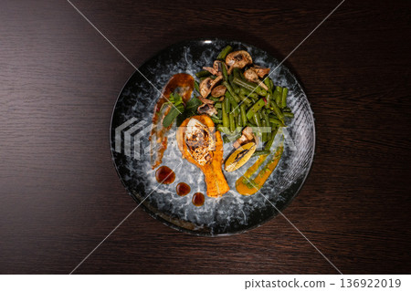 Fried salmon with vegetables and mushrooms Fried salmon with vegetables and mushrooms 136922019