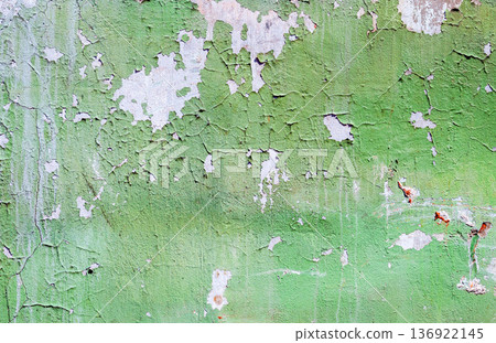 Texture of old concrete wall with cracks and peeling paint. Cracked grunge wall background 136922145