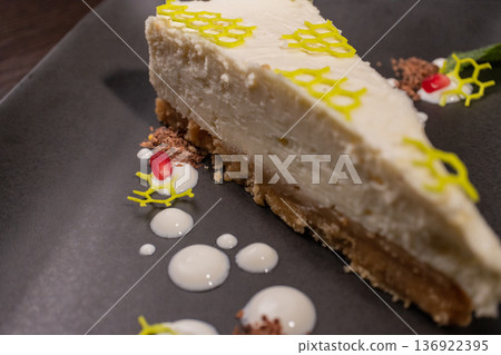 A slice of cottage cheese pie on a plate with 136922395
