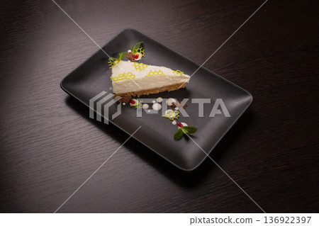 A slice of cottage cheese pie on a plate with A slice of cottage cheese pie on a plate with 136922397