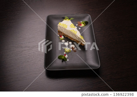 A slice of cottage cheese pie on a plate with A slice of cottage cheese pie on a plate with 136922398
