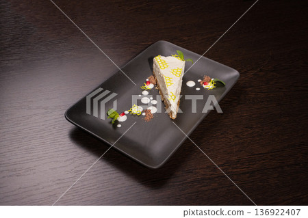 A slice of cottage cheese pie on a plate with A slice of cottage cheese pie on a plate with 136922407