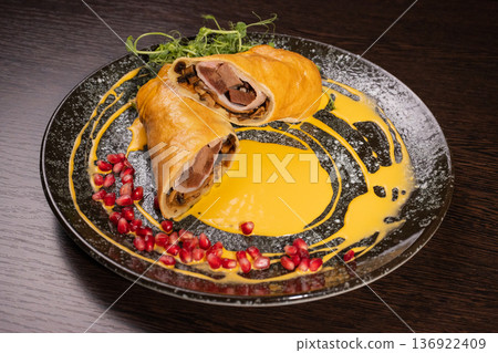 Pancakes with meat filling and sauce Pancakes with meat filling and sauce 136922409