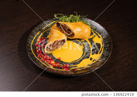 Pancakes with meat filling and sauce Pancakes with meat filling and sauce 136922419