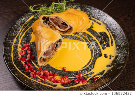 Pancakes with meat filling and sauce Pancakes with meat filling and sauce 136922422