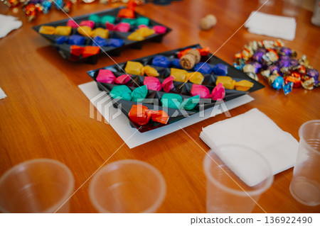 Multicolored candies on the table Multicolored candies on the table 136922490