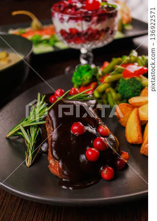 A plate of fried meat, fried potatoes and A plate of fried meat, fried potatoes and 136922571