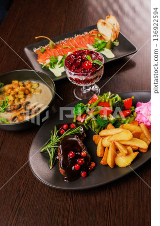 Several dishes for one person on the table Several dishes for one person on the table 136922594