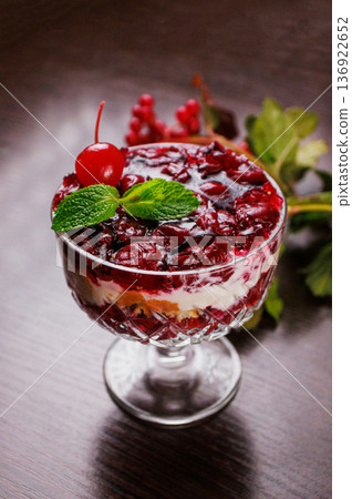 Dessert of pickled cherries with cream in a glass Dessert of pickled cherries with cream in a glass 136922652