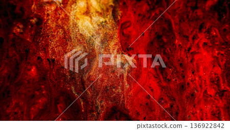 Shimmering mix. Ink stream defocused. Yellow red black sparkling color particles blending on abstract magma leak texture background. Shimmering mix. Ink stream defocused. Yellow red black sparkling color particles blending on abstract magma leak texture background. 136922842
