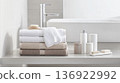 Stack of soft folded towels on marble shelf in modern bathroom, background 136922992