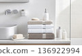 Stack of soft folded towels on marble shelf in modern bathroom, background 136922994