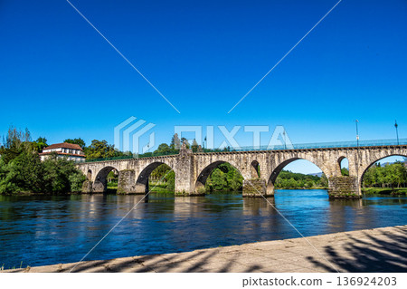 Bridge of Ponte da Barca, ancient portuguese village at Minho river in Nationalpark Peneda-Geres in North Portugal Bridge of Ponte da Barca, ancient portuguese village at Minho river in Nationalpark Peneda-Geres in North Portugal 136924203