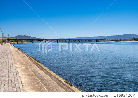The Gustave Eiffel Bridge over the river Lima in Viana do Castelo in Portugal. Panoramic cityscape view of Viana and the Marina. 136924207