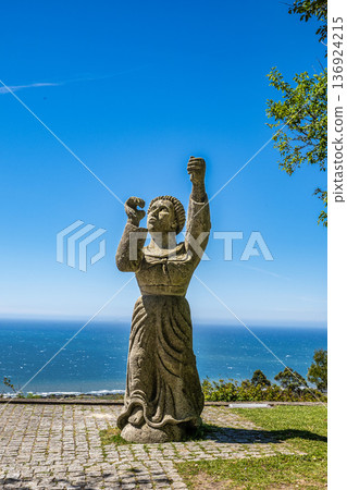 Statue at top of Mount Santa Luzia in Viana do Castelo, Portugal. Area beaches in background 136924215