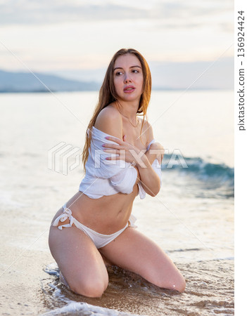 Woman in bikini enjoying tropical beach and caribbean summer vacation 136924424