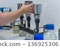 sample filtration sterilization of stainless steel funnels for microbiological testing in laboratory 136925306