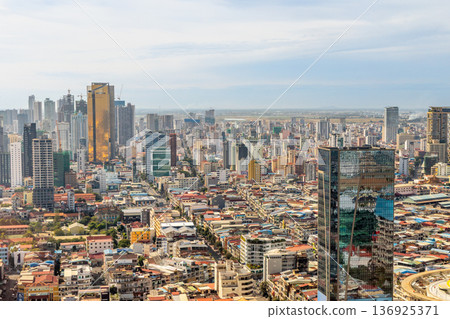 Modern office downtown skyscrapers buildings with residential areas in rapidly developing Phnom Penh central business district panorama, Cambodia 136925371