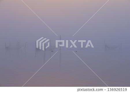 Misty landscape at sunrise Misty landscape at sunrise 136926519