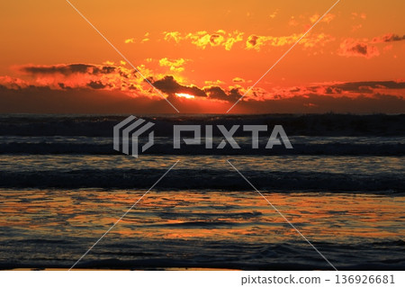 A sea stained in a morning glow A sea stained in a morning glow 136926681