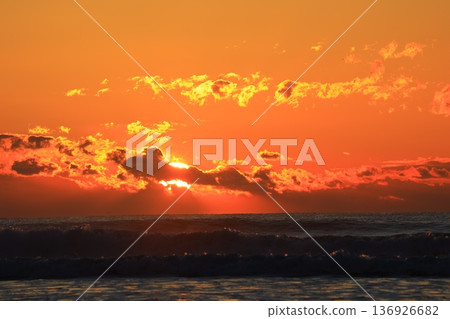 A sea stained in a morning glow A sea stained in a morning glow 136926682