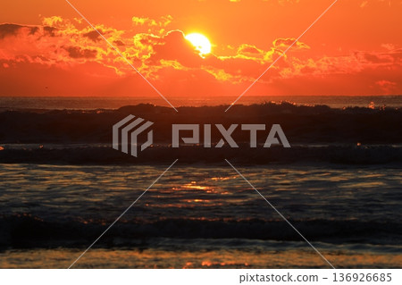 A sea stained in a morning glow A sea stained in a morning glow 136926685