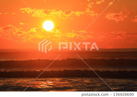 A sea stained in a morning glow A sea stained in a morning glow 136926690