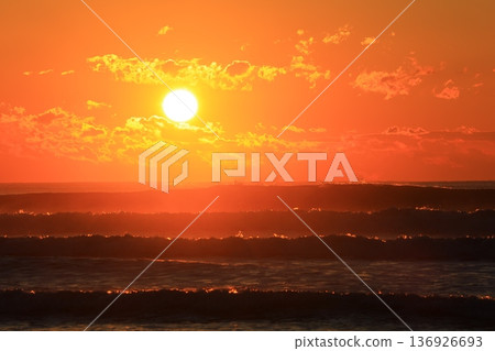 A sea stained in a morning glow A sea stained in a morning glow 136926693