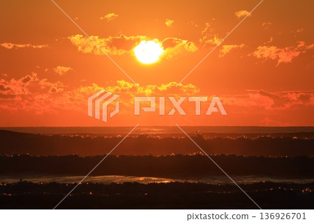 A sea stained in a morning glow A sea stained in a morning glow 136926701
