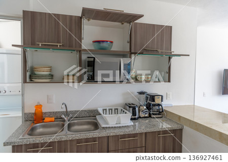 Modern kitchen with open cabinets and appliances Modern kitchen with open cabinets and appliances 136927461