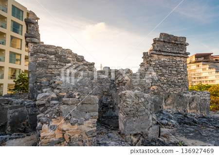 Mayan archaeological ruins in cancun mexico surrounded by city buildings Mayan archaeological ruins in cancun mexico surrounded by city buildings 136927469