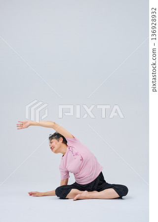 Senior woman doing yoga poses Senior woman doing yoga poses 136928932