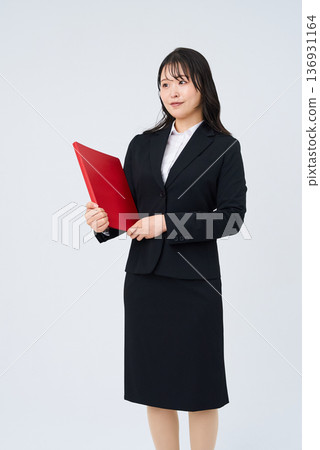 Young business woman with a smile Young business woman with a smile 136931164